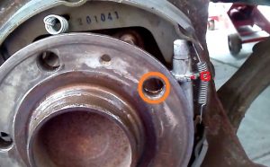 rear brake shows adjuster screw